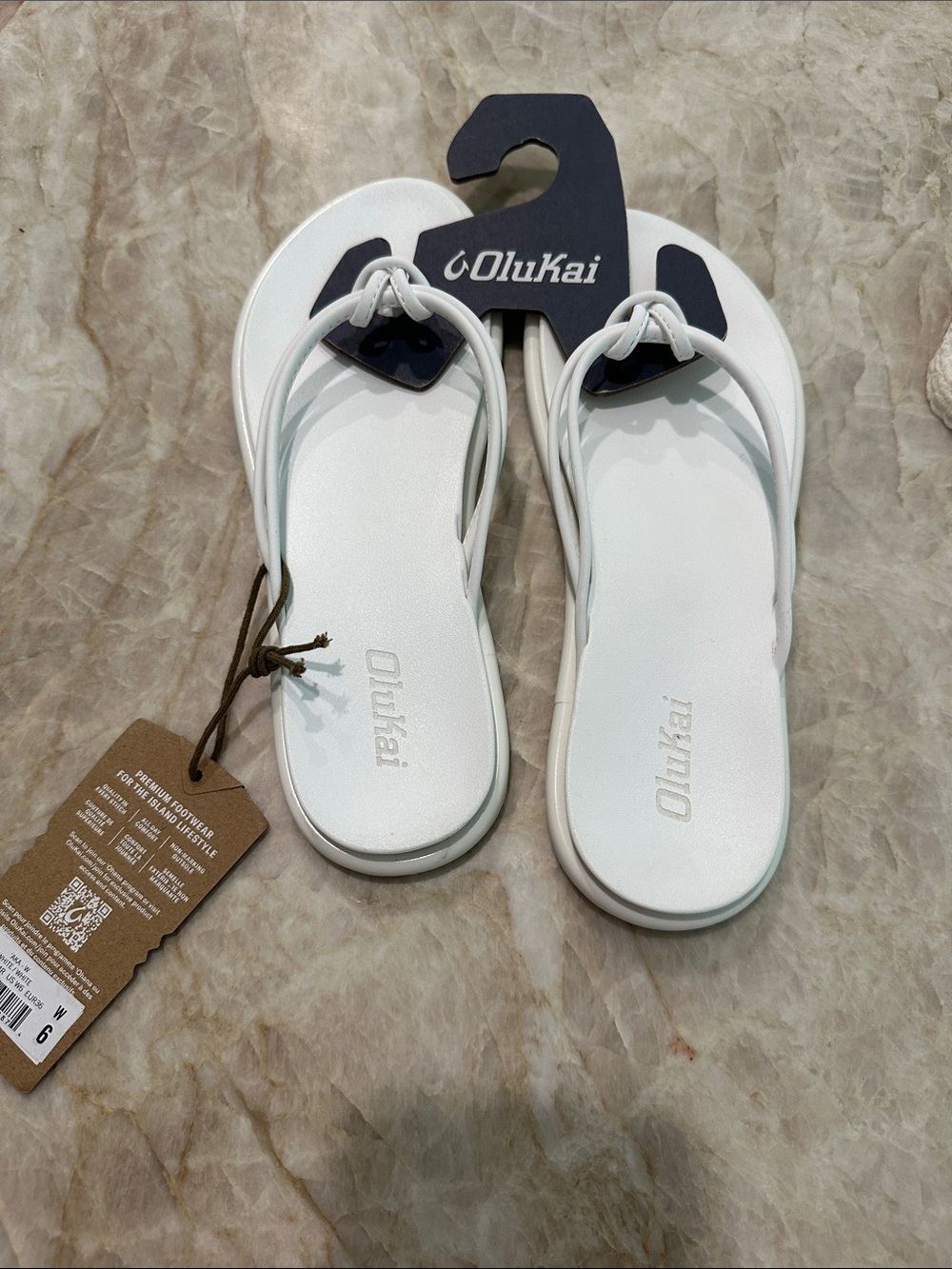 OluKai Women’s White Knot-Top Flip Flop Sandals